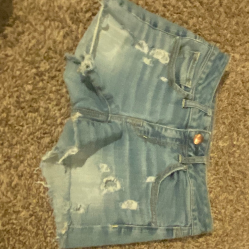 Blue ripped shorts